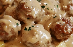 Easy Pleasy Meatballs over Buttered Noodles