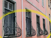 This Is Why Some Window Grills Have a Curve at the Bottom