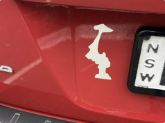 Why Drivers Display This Upside-Down Sticker on Their Cars